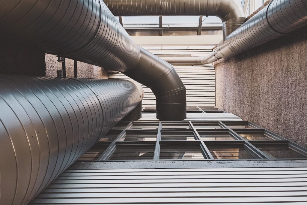 black and gray metal pipe