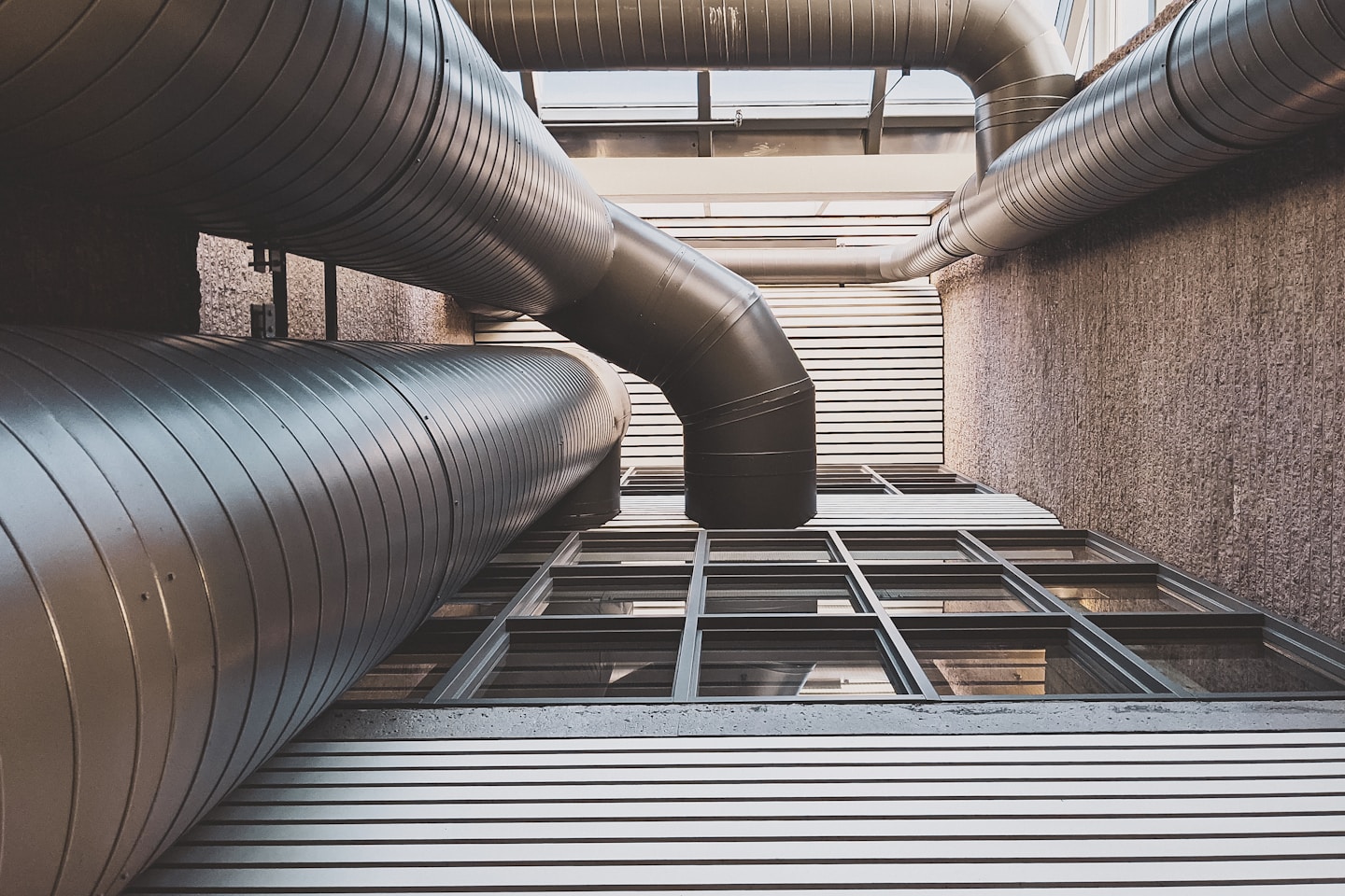 black and gray metal pipe