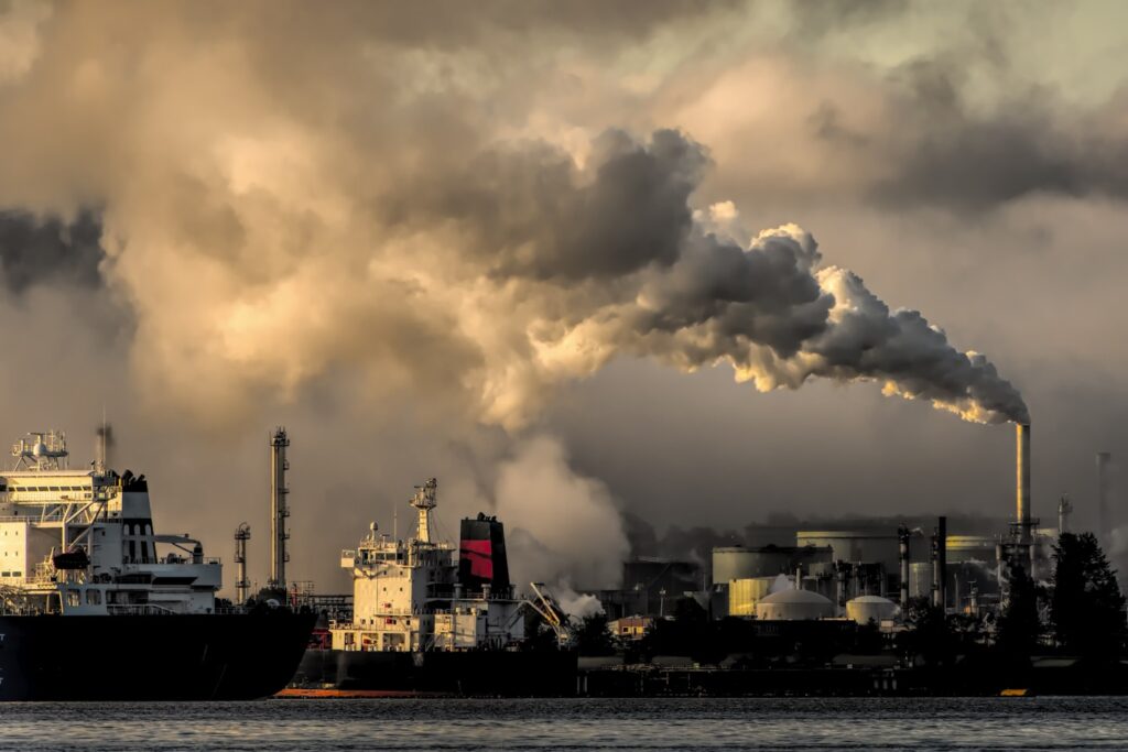 industrial harbor with smokestack pollution